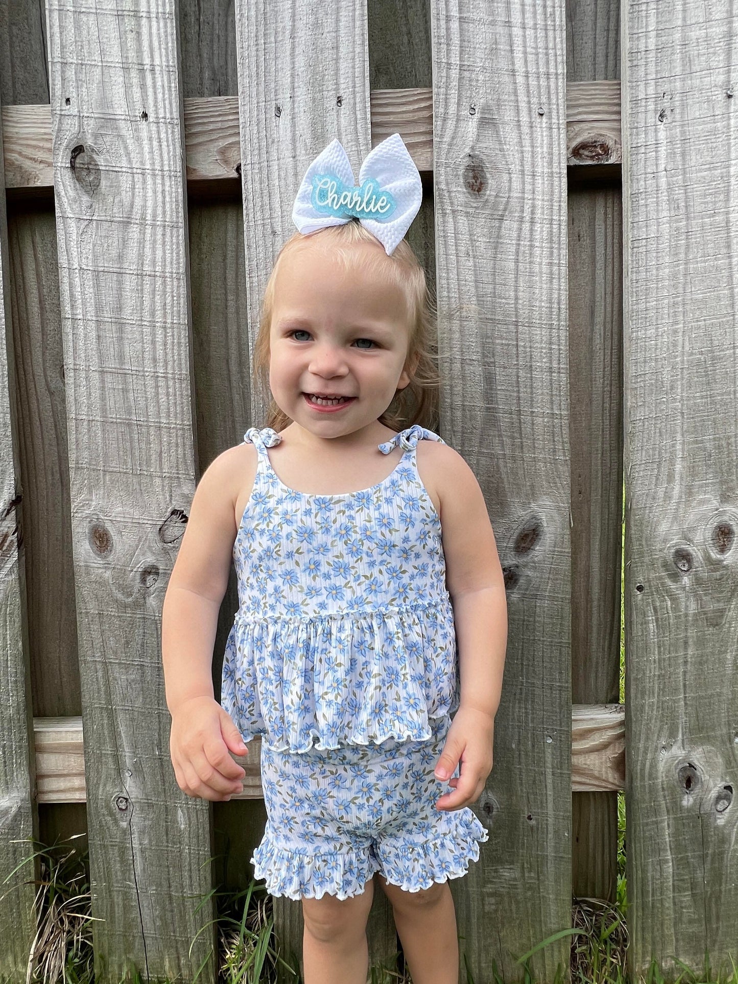 Ditzy Blue Floral Reverse Peplum + Ruffle Bummies