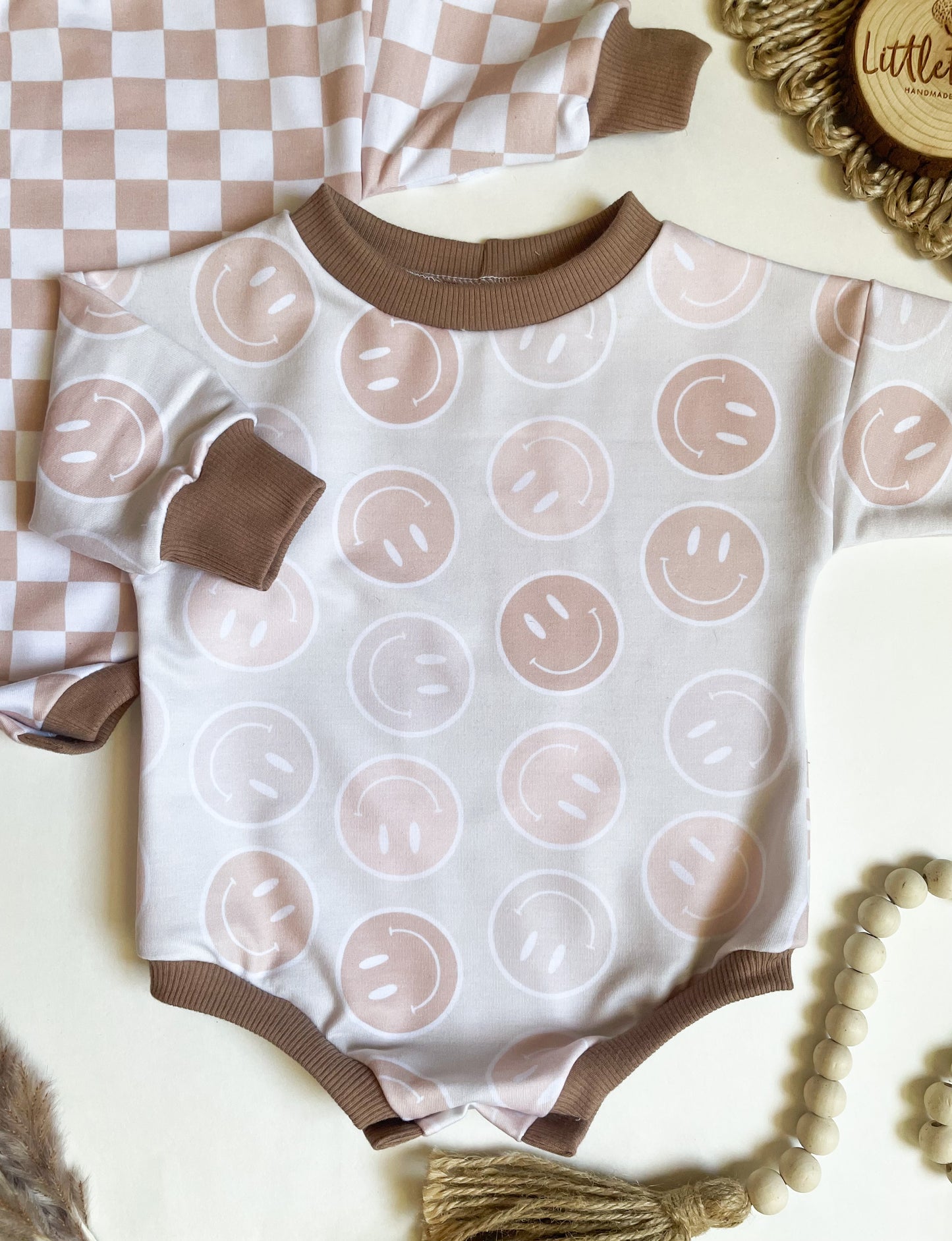 RTS 3-6M Neutral Smiley Sweater Romper